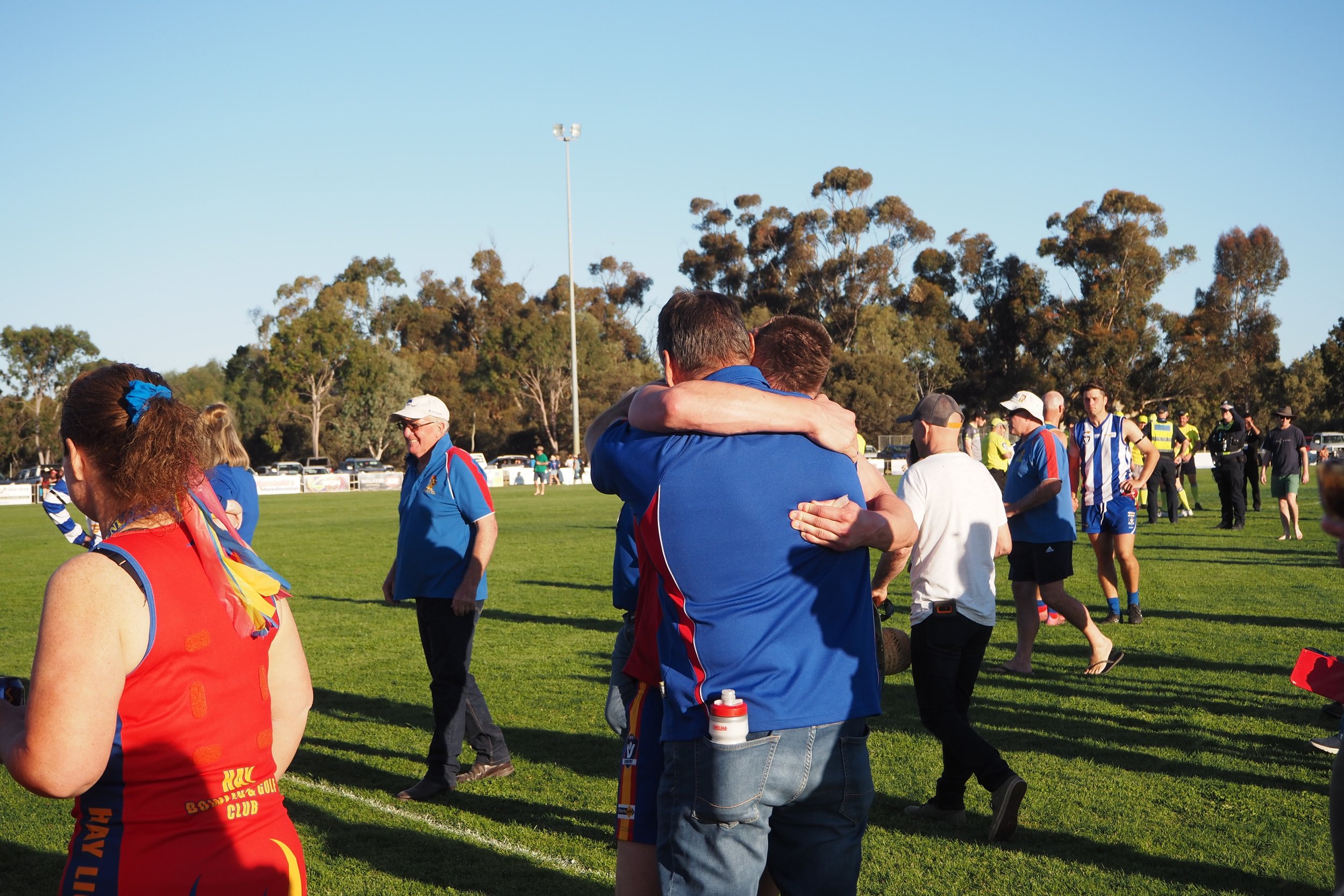 daniel and david zambon embrace gf lions 2023.jpeg