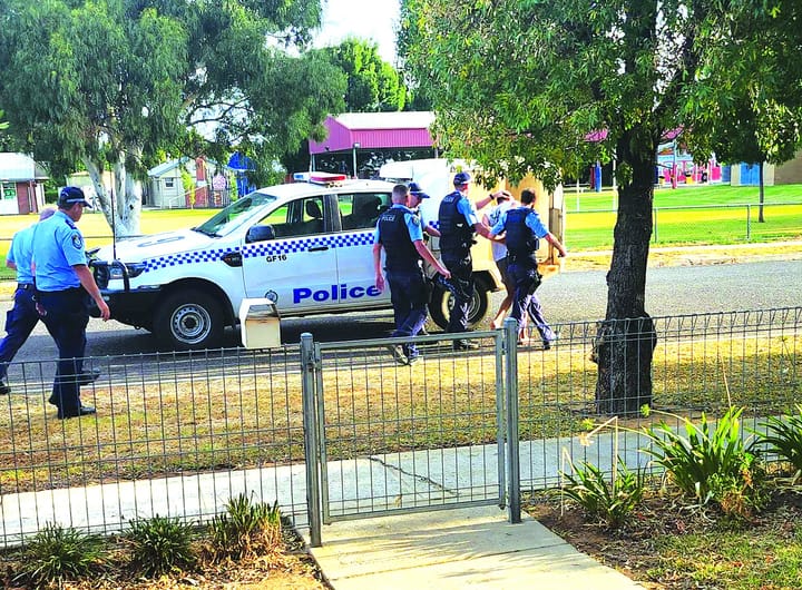 Community rally behind police in fugitive arrest